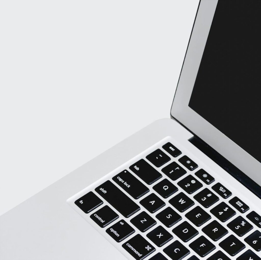 black and silver laptop computer